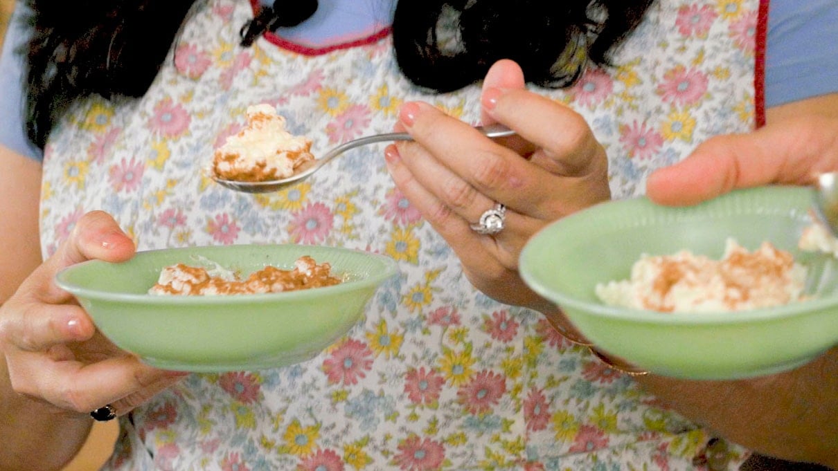 A bowl full of rice pudding.
